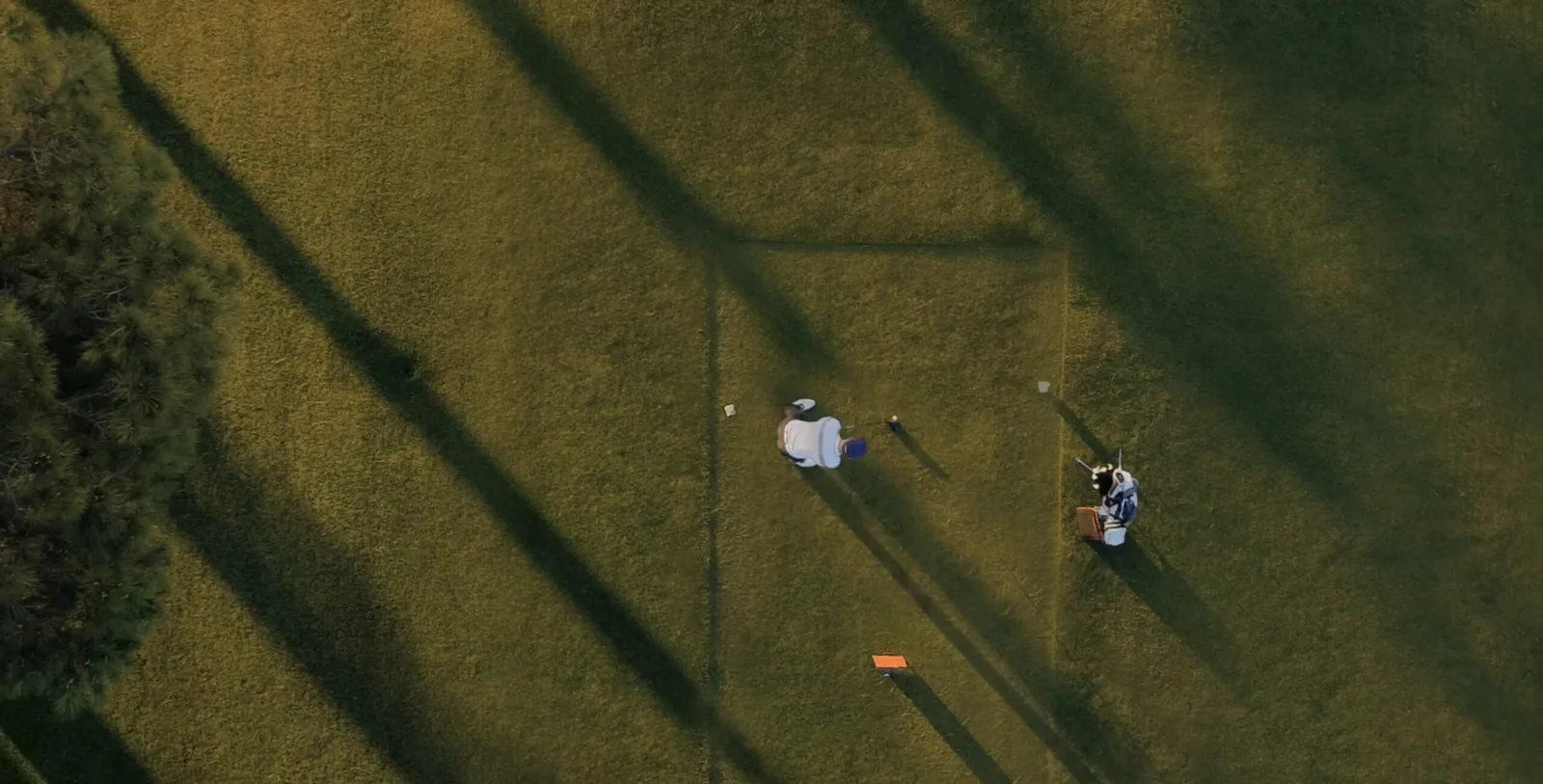 An aerial view of a golf course, the game a winter of indoor practice is preparing for